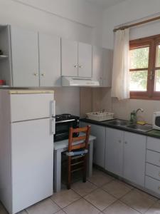 A kitchen or kitchenette at Sophie's traditional hospitality appartment Még 13 kép