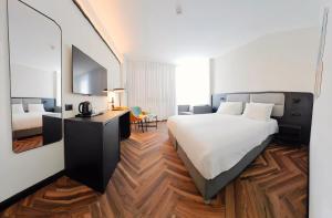 Voodi või voodid majutusasutuse Brown Jerusalem Hotel & Convention Center toas
