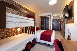 Postel nebo postele na pokoji v ubytování Hotel Magic Fantasy