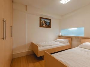 Postel nebo postele na pokoji v ubytování Apartment Haus Achenstrasse-2 by Interhome