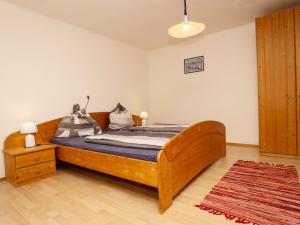Łóżko lub łóżka w pokoju w obiekcie Holiday Home Schwarzenegg by Interhome