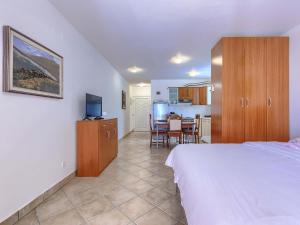 Posteľ alebo postele v izbe v ubytovaní Apartment Vivoda by Interhome