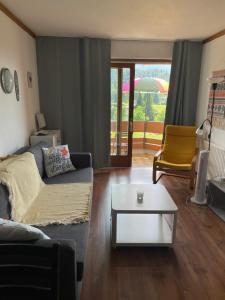 Posezení v ubytování Nette Ferienwohnung in Seenähe