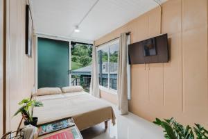 TV a/nebo společenská místnost v ubytování Ronnys Flat Manuel Antonio