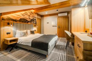 Łóżko lub łóżka w pokoju w obiekcie Hotel Maria & Spa