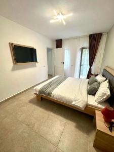 Ένα ή περισσότερα κρεβάτια σε δωμάτιο στο Twin Villa