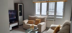 Posezení v ubytování Acogedor Apartamento Ribeira Sacra