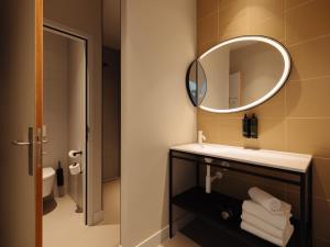 Een badkamer bij Conscious Hotel Museum Square