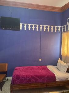 Postel nebo postele na pokoji v ubytování Taghadoute Hotel