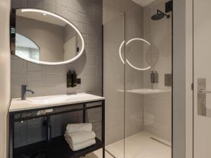 Een badkamer bij Conscious Hotel Museum Square