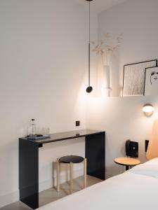 Een bed of bedden in een kamer bij Conscious Hotel Museum Square