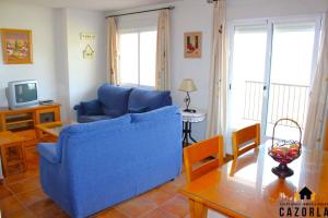 TV a/nebo společenská místnost v ubytování Alojamiento Las Vistas