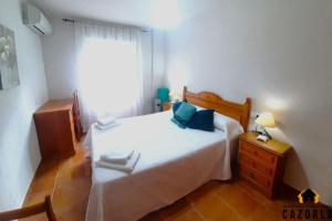 Postel nebo postele na pokoji v ubytování Alojamiento Las Vistas