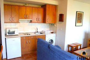 Kuchyň nebo kuchyňský kout v ubytování Alojamiento Las Vistas