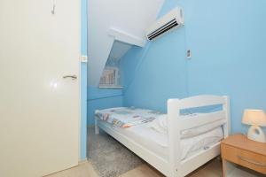 Posteľ alebo postele v izbe v ubytovaní Apartment Irvin