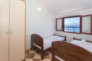 Ένα ή περισσότερα κρεβάτια σε δωμάτιο στο Apartment Sanda