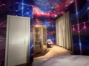 Postel nebo postele na pokoji v ubytování Hotel Royal