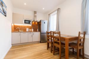 Kuchyňa alebo kuchynka v ubytovaní Apartmán U Doubků Horní Blatná