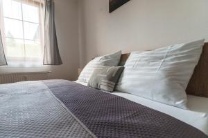 Posteľ alebo postele v izbe v ubytovaní Apartmán U Doubků Horní Blatná