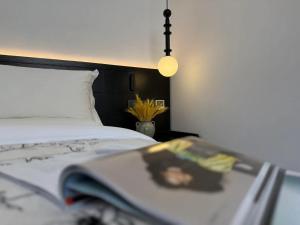 Postel nebo postele na pokoji v ubytování 山田心精品民宿 Valley Heart Inn