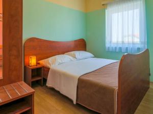 Postel nebo postele na pokoji v ubytování Apartment Delfin-7 by Interhome + 22 fotografií