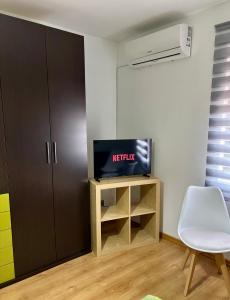 TV a/nebo společenská místnost v ubytování Casa Ubedí en pleno casco histórico + 11 fotografií