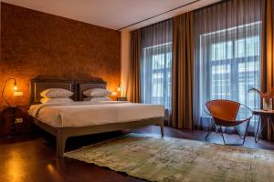 Postel nebo postele na pokoji v ubytování Hotel V Nesplein