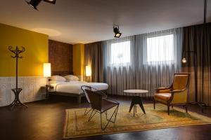 Postel nebo postele na pokoji v ubytování Hotel V Nesplein