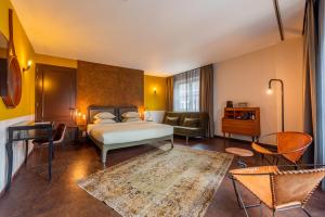 Postel nebo postele na pokoji v ubytování Hotel V Nesplein