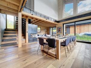 a large dining room with a table and chairs at Chalet Beli - Montriond - Centre village in Montriond