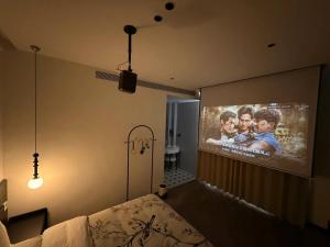 TV a/nebo společenská místnost v ubytování 山田心精品民宿 Valley Heart Inn