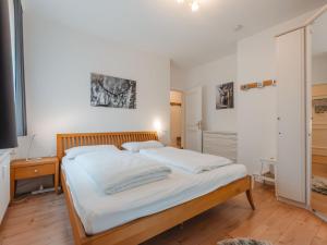 Posteľ alebo postele v izbe v ubytovaní Apartment Monte Grau Top 5 by Interhome