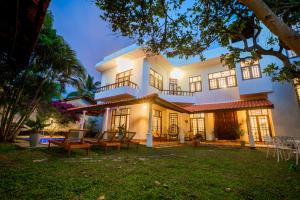 En hage utenfor Nibbana Mirissa Hotel