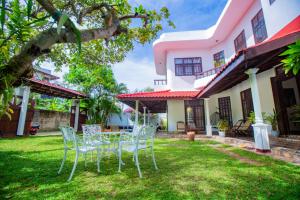 En hage utenfor Nibbana Mirissa Hotel