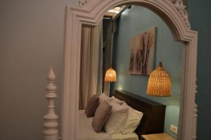 Letto o letti in una camera di Zephyr Luxe Apartment Sea and Mountain View