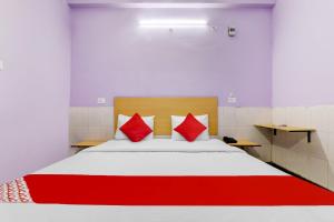 Hotel O SRV Palace客房内的一张或多张床位