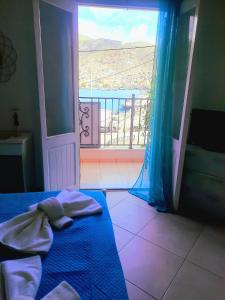 Postel nebo postele na pokoji v ubytování Faros studios Kalymnos
