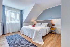 Giường trong phòng chung tại Ferienhaus "Ankersteed"