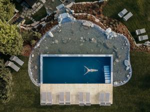The swimming pool at or close to Green Luxury Hotel Pfösl