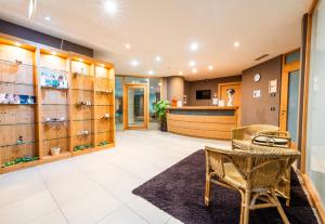 Kuchyň nebo kuchyňský kout v ubytování Alpine Mugon Hotel