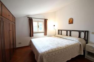 Ένα ή περισσότερα κρεβάτια σε δωμάτιο στο Villa Claudia