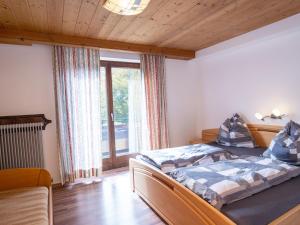 Posteľ alebo postele v izbe v ubytovaní Apartment Tirol by Interhome