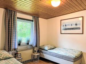 Postel nebo postele na pokoji v ubytování Holiday Home Andrea by Interhome