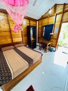 Postel nebo postele na pokoji v ubytování Bashi eco beach cabana