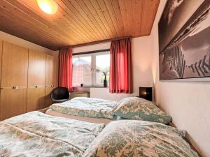 Postel nebo postele na pokoji v ubytování Holiday Home Andrea by Interhome