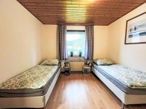 Postel nebo postele na pokoji v ubytování Holiday Home Andrea by Interhome