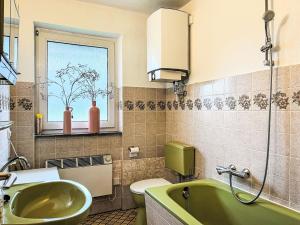 Koupelna v ubytování Holiday Home Andrea by Interhome