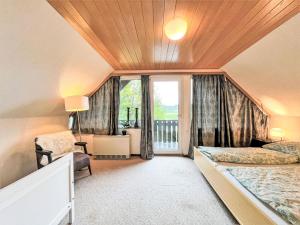 Postel nebo postele na pokoji v ubytování Holiday Home Andrea by Interhome