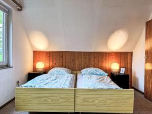 Postel nebo postele na pokoji v ubytování Holiday Home Andrea by Interhome