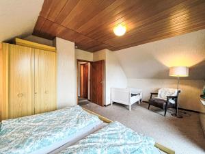 Postel nebo postele na pokoji v ubytování Holiday Home Andrea by Interhome